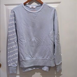 Sky-blue SoulCycle sweatshirt